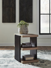 Ashley Furniture Rylandyn end table with a wooden top and metal frame, featuring a modern design and warm wood finish.