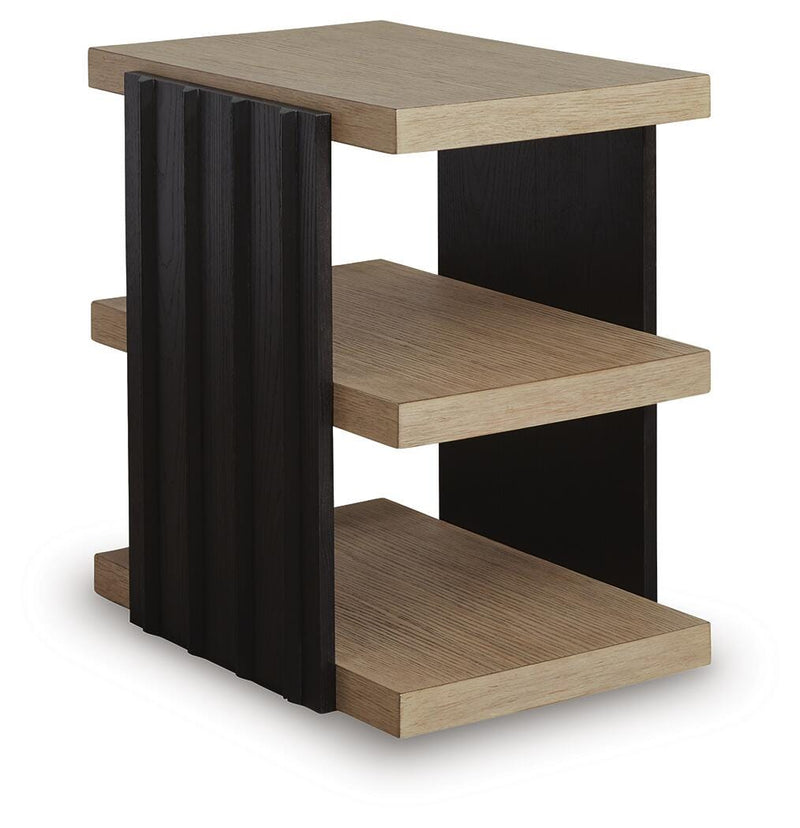 Ashley Furniture Rylandyn End Table with a sleek wooden surface and modern design, shown from an angled side view.
