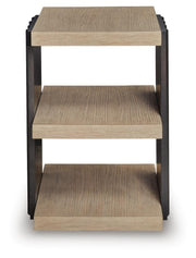 Ashley Furniture Rylandyn End Table with a wood finish, square top, and tapered legs, shown from a front head-on perspective.