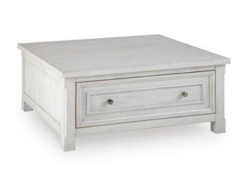 Ashley Furniture Robbinsdale lift-top coffee table with angled closed position, showcasing the sleek wooden design and functional lift mechanism.