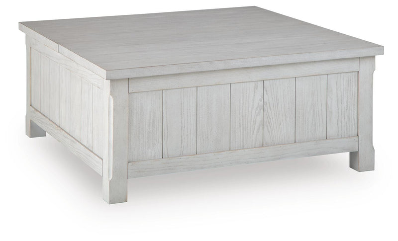 Ashley Furniture Robbinsdale lift-top coffee table with storage, featuring a dark wood finish and a spacious lift-up tabletop.