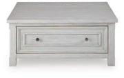 Ashley Furniture Robbinsdale lift-top coffee table with a sleek wood finish and a functional lift-top design.