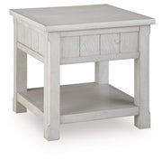 Ashley Furniture Robbinsdale End Table with wood finish, featuring a sleek tabletop and storage drawer.