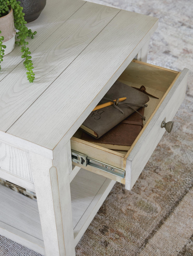 Ashley Furniture Robbinsdale end table with a dark wood finish and open shelving design.