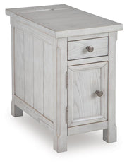 Ashley Furniture Robbinsdale chairside end table with a dark wood finish, angled design, and storage drawer, shown from an angle.