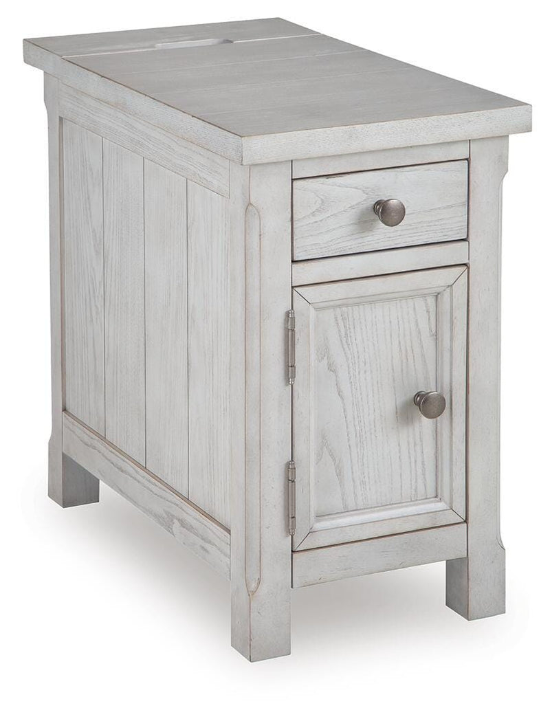 Ashley Furniture Robbinsdale chairside end table with a dark wood finish, angled design, and storage drawer, shown from an angle.