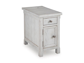 Ashley Furniture Robbinsdale chairside end table with a wooden finish, angled design, and compact shape for living room decor.