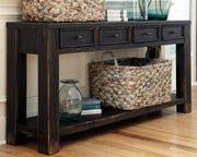 Ashley Furniture Gavelston sofa table with a sleek wooden top and sturdy legs, perfect for living room or entryway decor.
