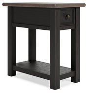 Ashley Furniture Tyler Creek end table set featuring two stylish wooden tables with a warm finish, shown from an angled view.