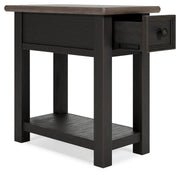 Ashley Furniture Tyler Creek end table set showing two wooden tables with open shelving and a warm finish, angled view.