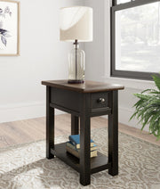 Ashley Furniture Tyler Creek end table set featuring two wooden tables with decorative metal accents and a rustic finish.