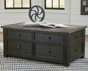 Ashley Furniture Tyler Creek Occasional Table Set featuring two wooden tables with a warm finish and modern design.