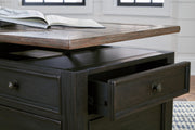 Ashley Furniture Tyler Creek occasional table set with two wooden tables featuring a rustic finish and sturdy design.