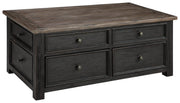 Ashley Furniture Tyler Creek Table Set featuring a wooden dining table and matching chairs with a warm finish.