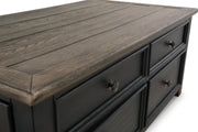 Ashley Furniture Tyler Creek occasional table set with three wooden tables featuring a dark finish and modern design.