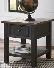 Ashley Furniture Tyler Creek table set with a rectangular dining table and matching chairs in a warm wood finish.