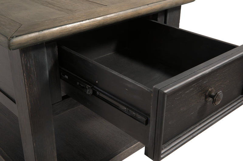 Ashley Furniture Tyler Creek table set with a wooden finish, featuring a rectangular dining table and matching chairs.
