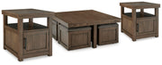 Ashley Furniture Boardernest occasional table set featuring three wooden tables with sleek, modern design and dark finish.