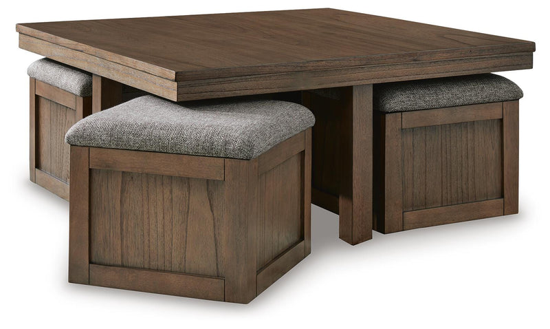 Ashley Furniture Boardernest Occasional Table Set featuring three stylish nesting tables with wooden tops and black metal frames.