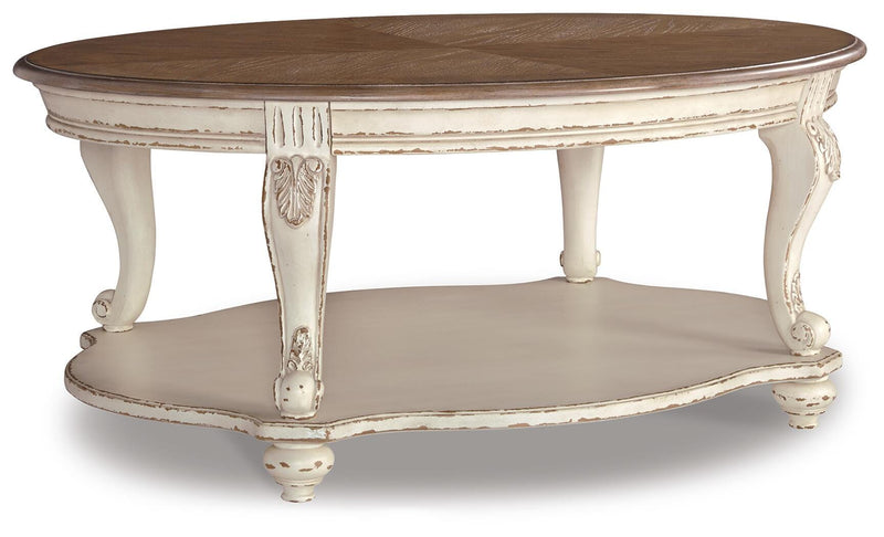Ashley Furniture Realyn Occasional Table Set featuring three stylish tables with wooden finishes and modern design angles.