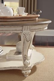 Ashley Furniture Realyn occasional table set with two stylish wooden tables featuring metal accents and modern design.