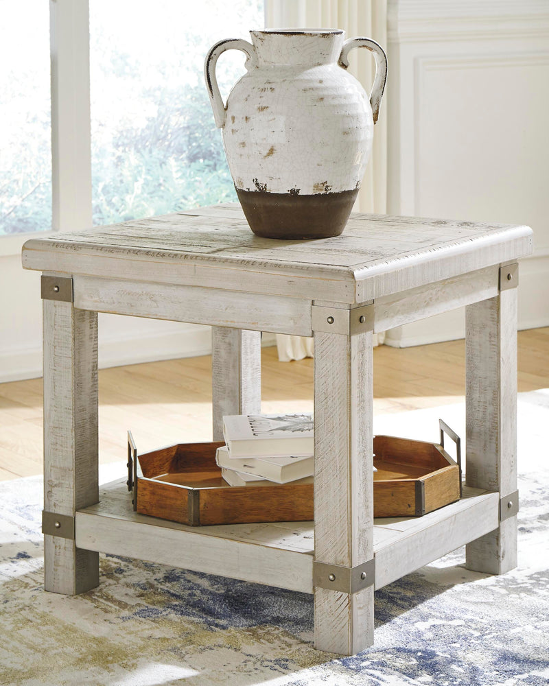 Ashley Furniture Carynhurst table set with three tables, featuring stylish wood finishes and modern design elements.