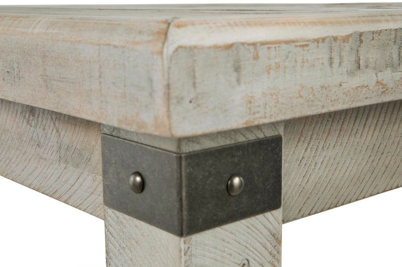 Ashley Furniture Carynhurst occasional table set with three wooden tables featuring dark finishes and sleek, modern designs.