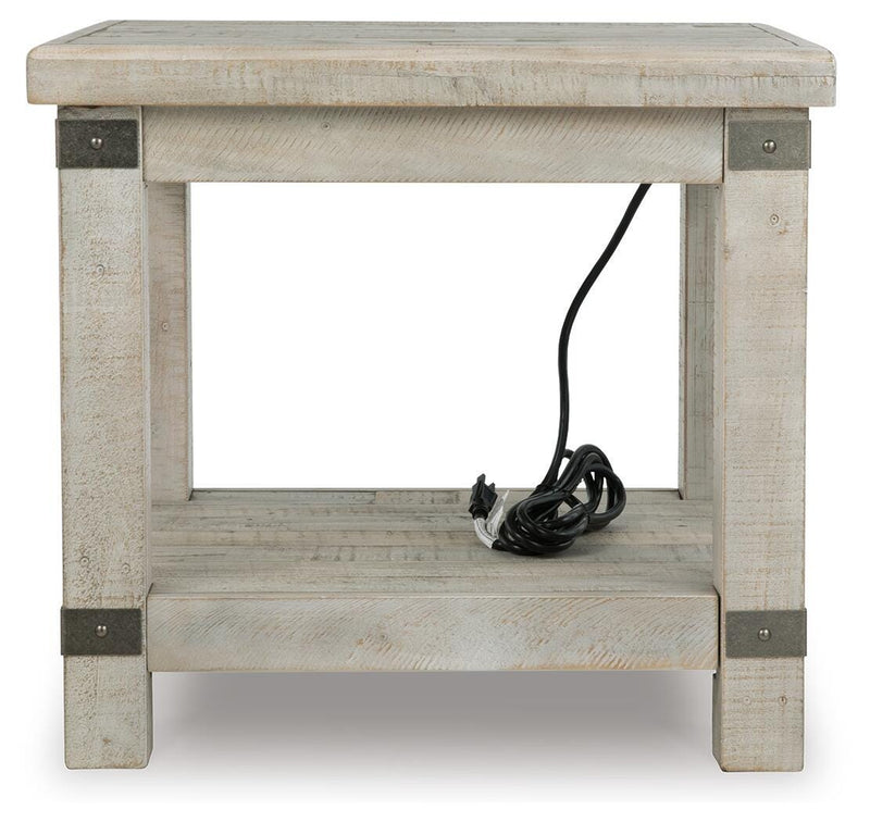 Ashley Furniture Carynhurst end table with a sleek wooden top and tapered legs, ideal for living room or bedroom decor.