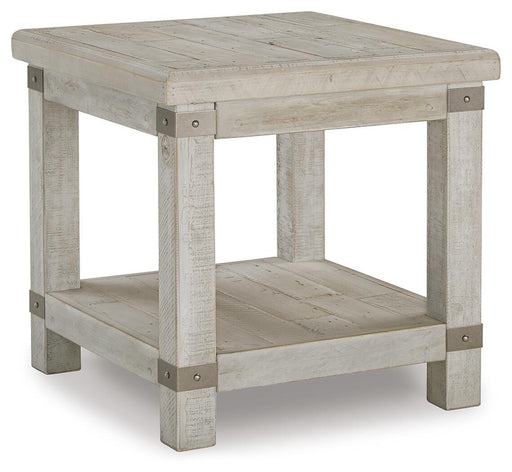 Ashley Furniture Carynhurst end table with a dark wood finish and a single drawer, showcasing a modern classic design.
