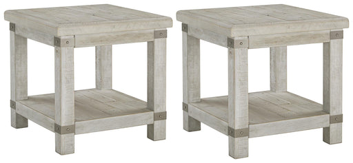 Ashley Furniture Carynhurst End Table Set featuring two wooden tables with a dark finish and modern design.