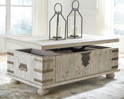 Ashley Furniture Carynhurst coffee table with lift top, showcasing open storage and modern design in a stylish living room setting.