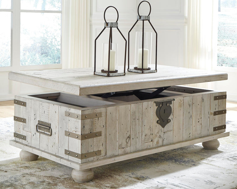 Ashley Furniture Carynhurst coffee table with lift top, showcasing open storage and modern design in a stylish living room setting.