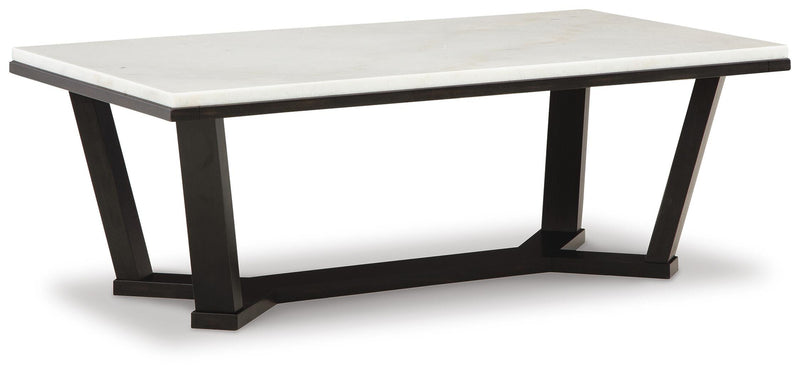 Ashley Furniture Fostead cocktail coffee table with a sleek wooden tabletop and modern design, shown from an angled view.