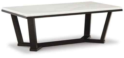 Ashley Furniture Fostead cocktail coffee table with a sleek wooden tabletop and modern design, shown from an angled view.