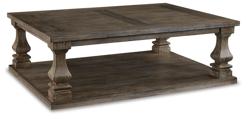 Ashley Furniture Johnelle Occasional Table Set featuring two elegant tables with dark wood finish and modern design.