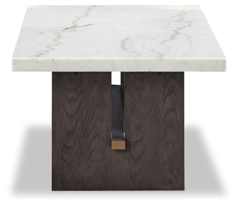 Ashley Furniture Burkhaus coffee cocktail table with a wooden finish and modern design, shown from a side angle.