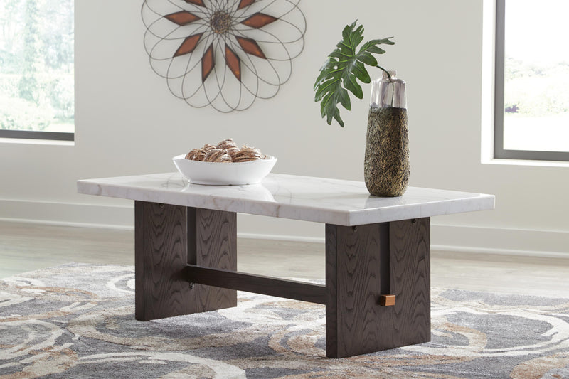 Ashley Furniture Burkhaus Occasional Table Set featuring two modern coffee tables with sleek wooden surfaces and metal legs.