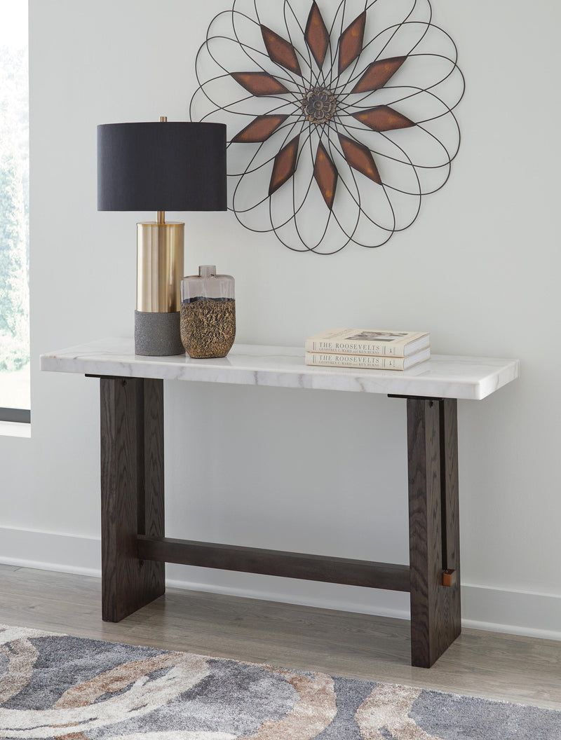 Ashley Furniture Burkhaus sofa table with a sleek wooden top and metal legs, perfect for living room decor.