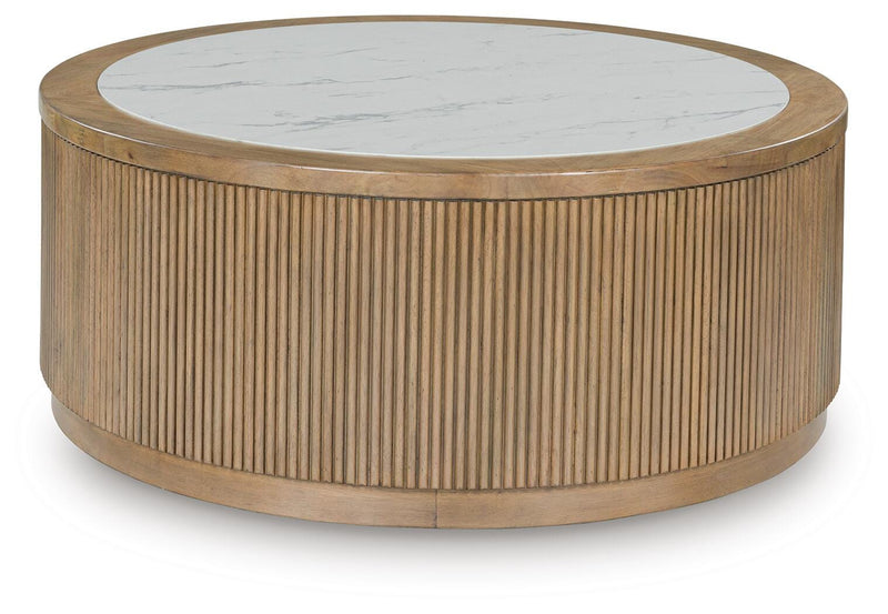 Ashley Furniture Camdill cocktail coffee table with a sleek wood finish and modern design, featuring a rectangular top and sturdy legs.