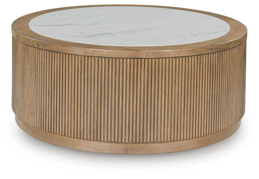 Ashley Furniture Camdill cocktail coffee table with a sleek wood finish and modern design, featuring a rectangular top and sturdy legs.
