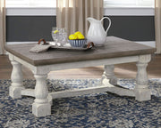 Ashley Furniture Havalance Occasional Table Set featuring two modern tables with wooden tops and sleek metal legs.