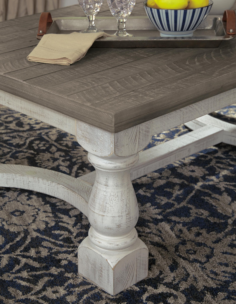 Ashley Furniture Havalance occasional table set with two modern wooden tables featuring sleek tops and sturdy legs.
