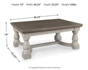 Ashley Furniture Havalance occasional table set featuring two sleek, modern tables with wood finish and metal frames.