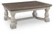 Ashley Furniture Havalance Occasional Table Set featuring two modern wood tables with sleek designs and dark finish.
