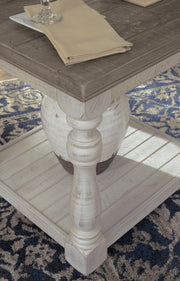 Ashley Furniture Havalance Occasional Table Set featuring three modern tables with wood finishes and sleek metal legs.