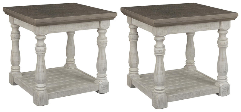 Ashley Furniture Havalance end table set showing two wooden tables with dark finish and modern design details.
