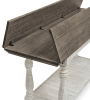 Ashley Furniture Havalance sofa console table with sleek wooden surface and modern design, detailed image showing the tabletop and legs.