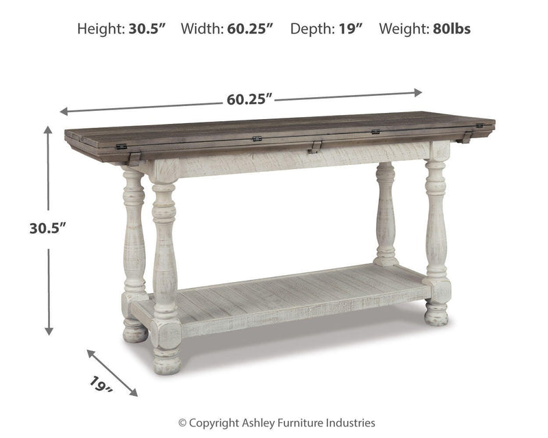 Ashley Furniture Havalance sofa console table with a sleek wooden finish and modern design, ideal for living room decor.