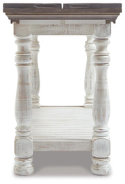 Ashley Furniture Havalance sofa console table with a sleek design, featuring a dark wood finish and modern style.