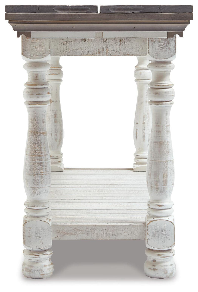 Ashley Furniture Havalance sofa console table with a sleek design, featuring a dark wood finish and modern style.